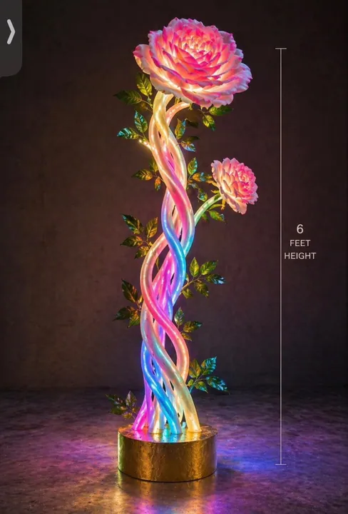 Six-foot iridescent LED rose sculpture on a gold base